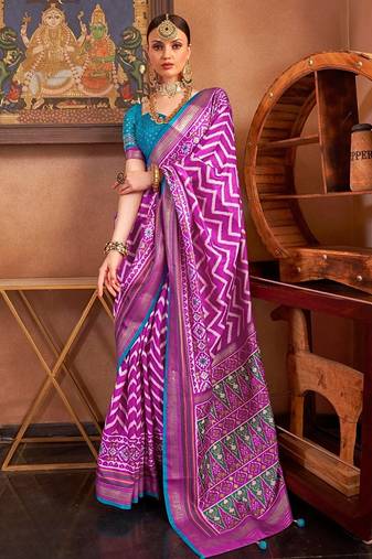 bold pink patola silk blend saree with traditional motifs & zari/contrast border | unstitched blouse