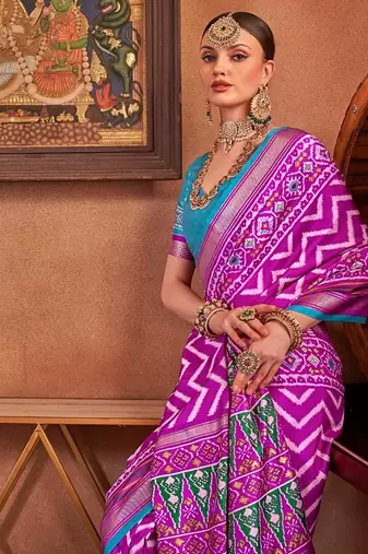 bold pink patola silk blend saree with traditional motifs & zari/contrast border | unstitched blouse