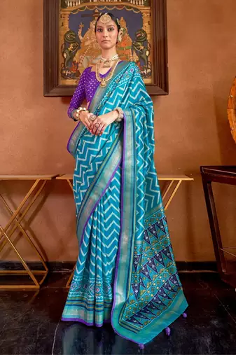 sky  blue patola silk blend saree with traditional motifs & zari/contrast border | unstitched blouse