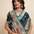 green color green fabric wevon meenakari designer sophisticated ceremonial saree
