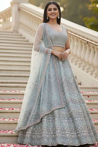Mesmerizing Sky Handwork Crystal Pipe, Handwork Beads, Sequins and Dori Embroidered Net Wedding Lehenga Choli