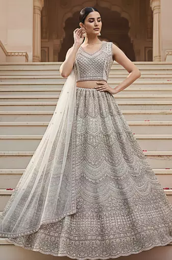 Delightful Off-white Handwork Crystal Pipe, Handwork Beads, Sequins and Dori Embroidered Net Lehenga Choli for wedding