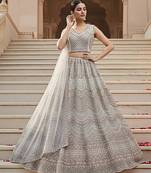 Delightful Off-white Handwork Crystal Pipe, Handwork Beads, Sequins and Dori Embroidered Net Lehenga Choli for wedding