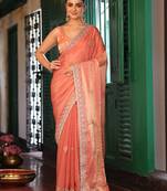 orange color designer tissue fabric saree for ceremonial looks
