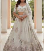 Comely White Dori work, Multi thread and sequins, Chapat zari work, Diamond work Heavy Net Lehenga Choli