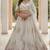 Comely White Dori work, Multi thread and sequins, Chapat zari work, Diamond work Heavy Net Lehenga Choli