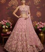 Dazzling Pink Crystal Pipe handwork, Multicolor Motif, Sober Color Sequins, Zari, Dori Embroidered Net lehenga choli