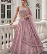 Entrancing Baby Pink Dori, Multi Thread, Sequence Embroidered and Zircon Diamond Heavy Net Wedding Lehenga Choli