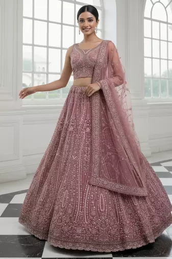 Enthralling Pink Dori, Multi Thread, Sequence Embroidered and Zircon Diamond Heavy Net Bridal Lehenga Choli