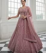 Enthralling Pink Dori, Multi Thread, Sequence Embroidered and Zircon Diamond Heavy Net Bridal Lehenga Choli