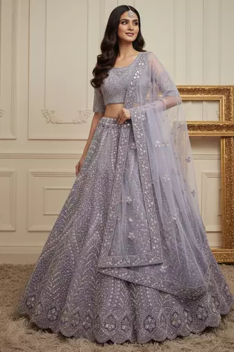 Delightful Lilac Dori Embroidery, Zari work, Sequence work, Thread and motif work Heavy net fabric Wedding Lehenga Choli