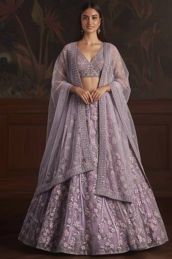 Comely Light Purple Fancy, Dori,  Studded Sequins Embroidered with Zircon Diamond Studded Net wedding wear lehenga choli