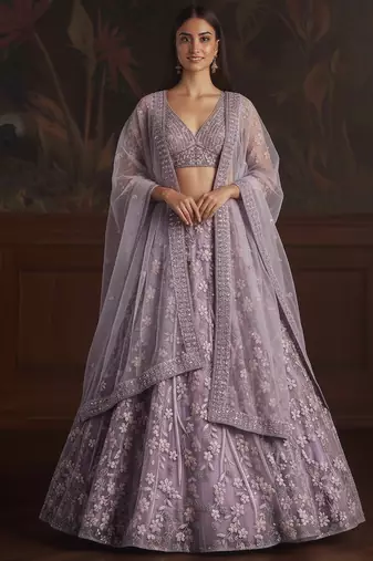Comely Light Purple Fancy, Dori,  Studded Sequins Embroidered with Zircon Diamond Studded Net wedding wear lehenga choli