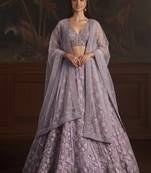 Comely Light Purple Fancy, Dori,  Studded Sequins Embroidered with Zircon Diamond Studded Net wedding wear lehenga choli
