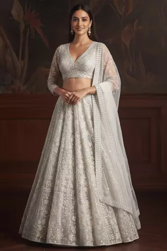 Delightfully White Fancy Dori, Sequins Studded Embroidered with Zircon Diamond Studded Net bridal wear lehenga choli