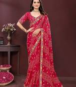 pink color georgette fabric bandhej printed traditional saree