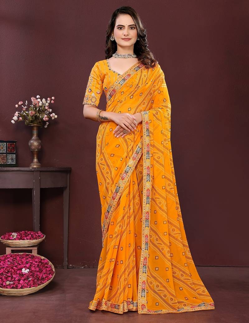 yellow color georgette fabric bandhej printed traditional saree