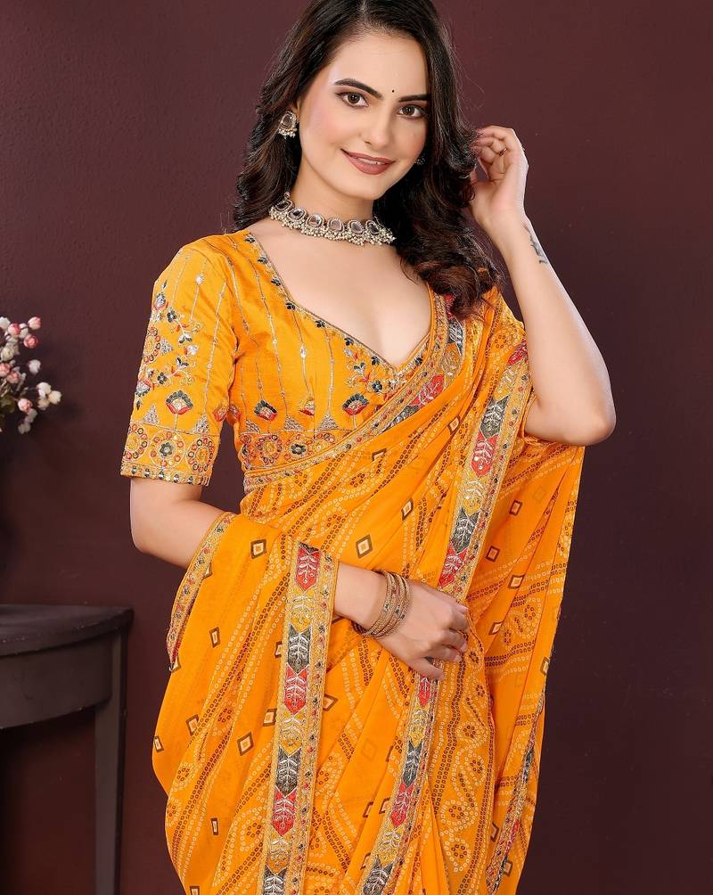 yellow color georgette fabric bandhej printed traditional saree