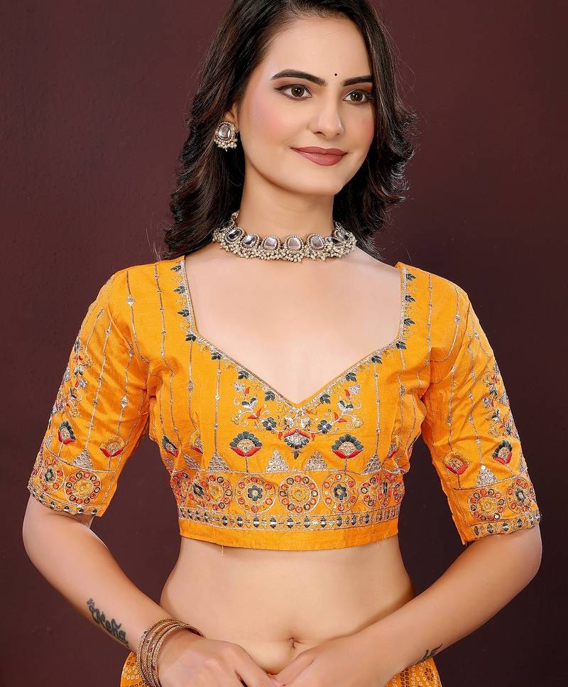 yellow color georgette fabric bandhej printed traditional saree