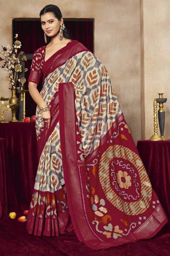 grey color tussar art silk fabric woven designer ethnic saree with patola print