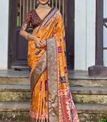 orange color silk blend blended traditional bandhani ajrakh printed saree