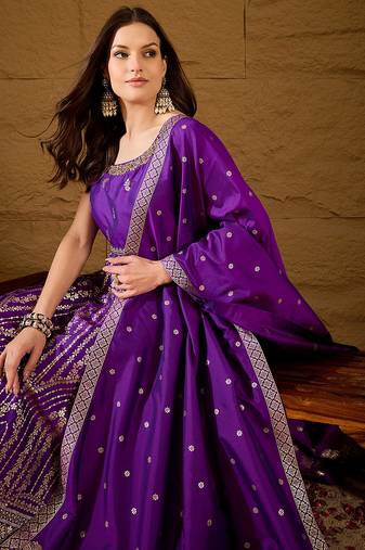Women purple silk blend solid woven design anarkali kurta trousers with dupatta