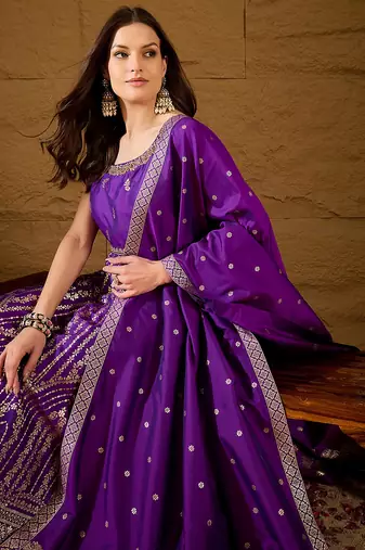 Women purple silk blend solid woven design anarkali kurta trousers with dupatta