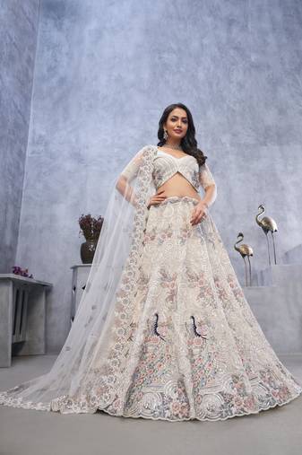 white embroidered net lehenga choli With Dupatta