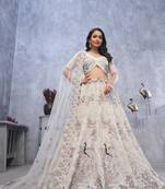 white embroidered net lehenga choli With Dupatta