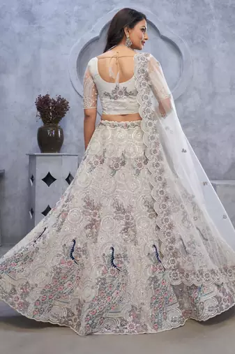 white embroidered net lehenga choli With Dupatta