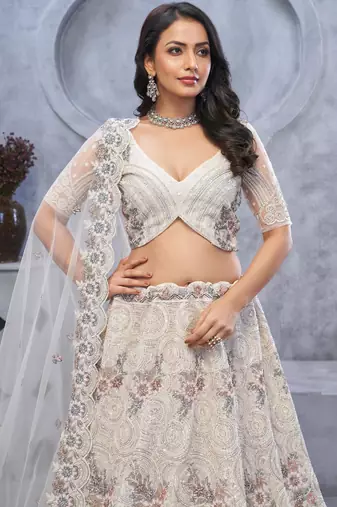 white embroidered net lehenga choli With Dupatta