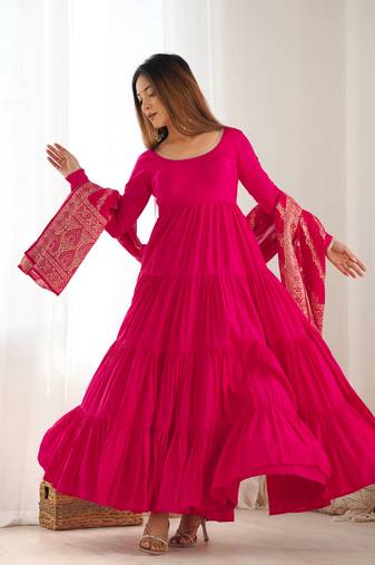 Rani pink color pure roman silk ruffle style anarkali suit