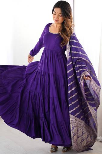 Purple color pure roman silk ruffle style anarkali suit
