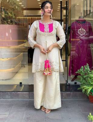 Floral embroidered white round neck kurta set with trouser 1