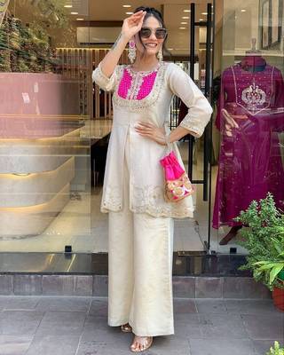 Floral embroidered white round neck kurta set with trouser 4