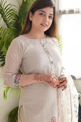 Floral embroidered beige round neck kurta set with trouser and dupatta
