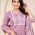 Floral embroidered mauve round neck kurta set with trouser and dupatta