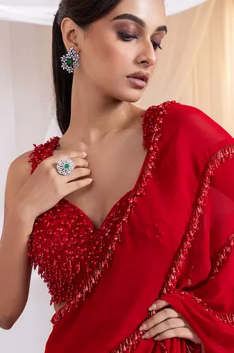Red embroidered silk saree
