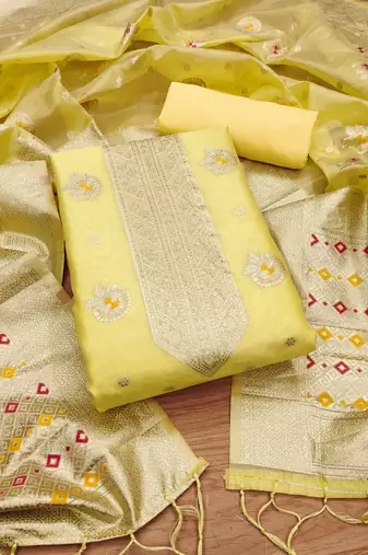 yellow zari woven banarasi dress materials