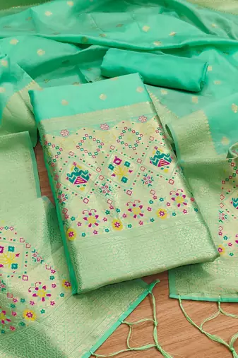 sea green zari woven banarasi dress materials