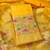 yellow zari woven banarasi dress materials