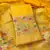 yellow zari woven banarasi dress materials
