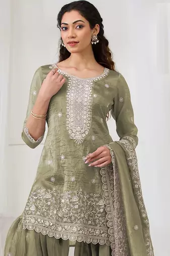 Green embroidered gold crush stitched palazzo style salwar suit