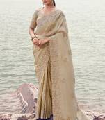 beige tissue silk blend heavy thread embroidered with sequins work saree with blouse