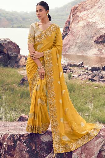 yellow tissue silk blend jacquard woven with embroidered border saree with blouse