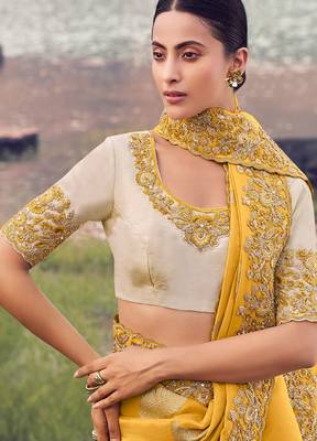 yellow tissue silk blend blend jacquard woven with embroidered border saree with blouse 2