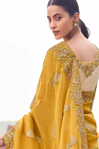 yellow tissue silk blend blend jacquard woven with embroidered border saree with blouse