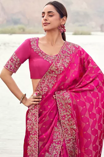 rani pink satin silk blend blend jacquard woven with embroidered border saree with blouse
