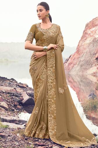 chiku banarasi silk blend heavy thread embroidered with sequins work saree with blouse