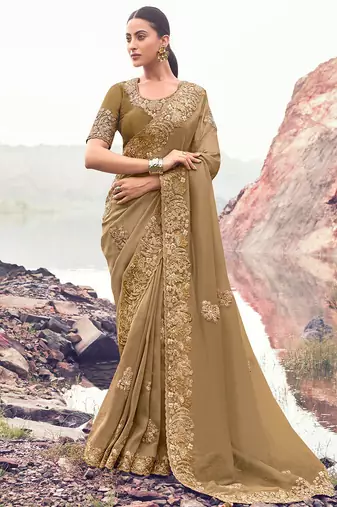 chiku banarasi silk blend heavy thread embroidered with sequins work saree with blouse